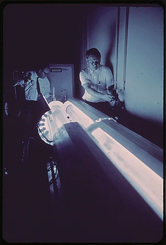 SCIENTISTS WITH PHOTOCHEMICAL TUBE REACTOR MANUFACTURE SMOG AT THE STATEWIDE AIR POLLUTION RESEARCH CENTER