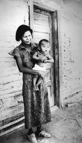 American Indian woman holding baby